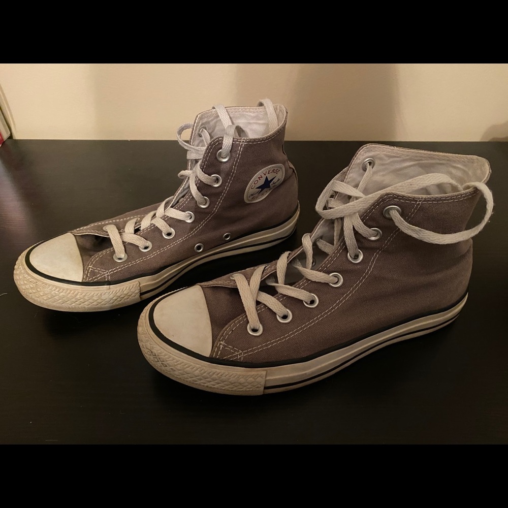 Converse monogrammed high tops.